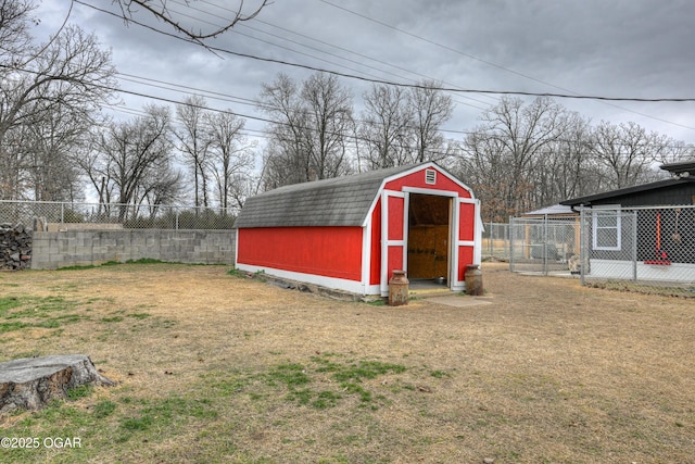 view of shed with a fenced backyard