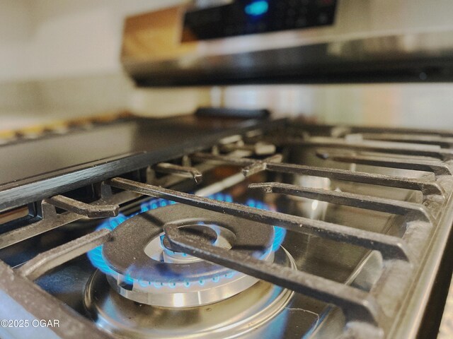 interior details with range with gas cooktop