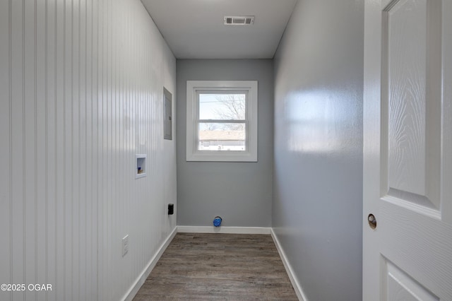 clothes washing area featuring laundry area, washer hookup, visible vents, baseboards, and dark wood-style floors