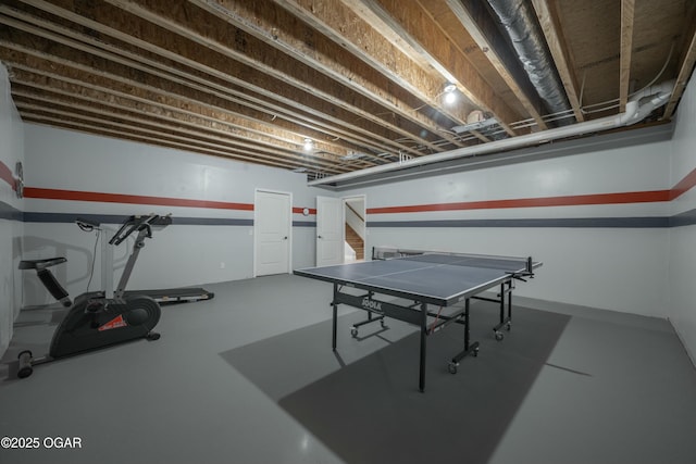 game room with concrete floors