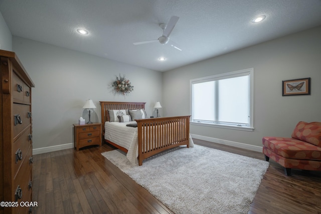 bedroom featuring recessed lighting, dark wood-style floors, baseboards, and ceiling fan