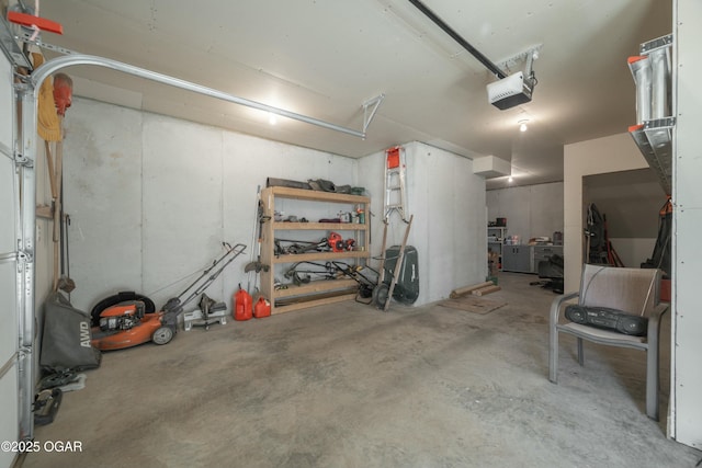 garage featuring a garage door opener