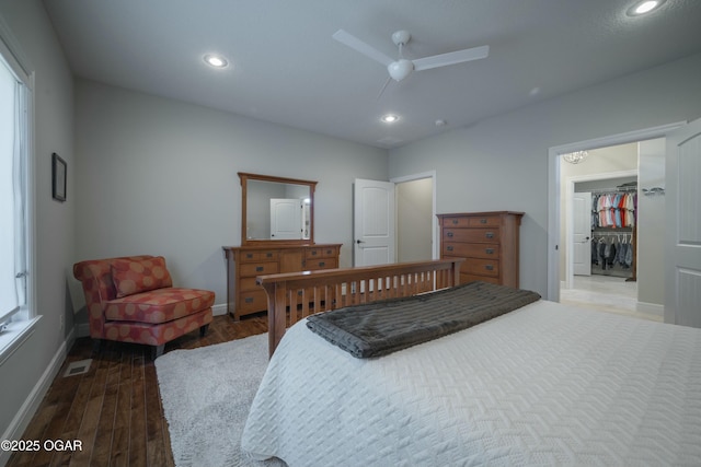 bedroom with wood finished floors, visible vents, baseboards, recessed lighting, and ceiling fan