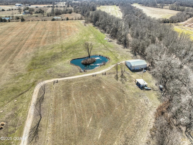 bird's eye view with a rural view and a water view