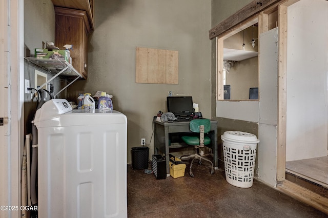 laundry area featuring independent washer and dryer and cabinet space