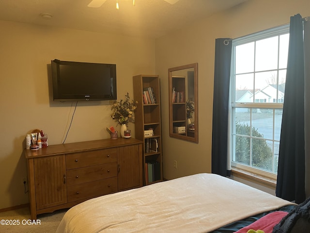 bedroom with light carpet