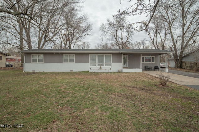 single story home with crawl space, a front lawn, concrete driveway, and brick siding