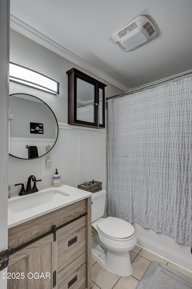 bathroom featuring visible vents, toilet, ornamental molding, tile patterned flooring, and vanity