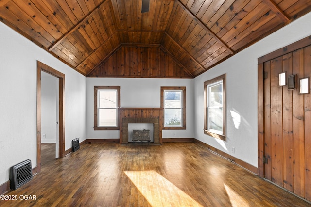 unfurnished living room with lofted ceiling, hardwood / wood-style flooring, a fireplace, wood ceiling, and baseboards