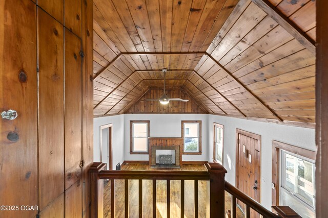 additional living space featuring lofted ceiling and wood ceiling