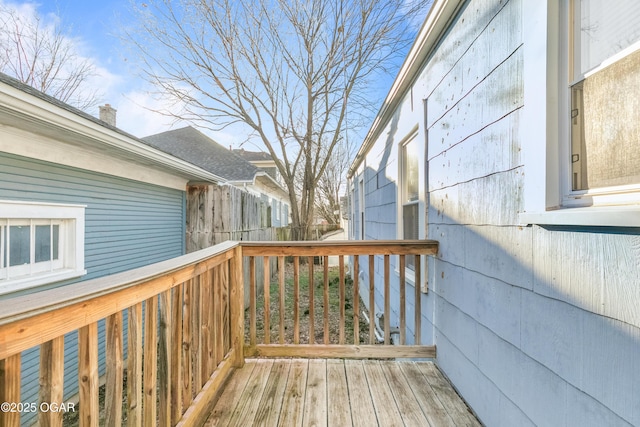 wooden deck featuring fence