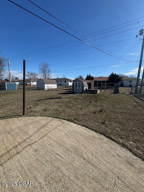 view of yard with fence