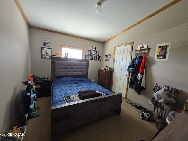 carpeted bedroom with lofted ceiling and ornamental molding