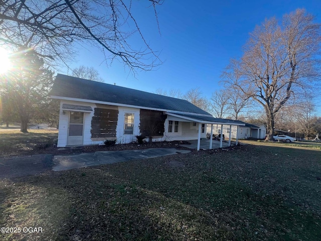 view of front of house with a carport