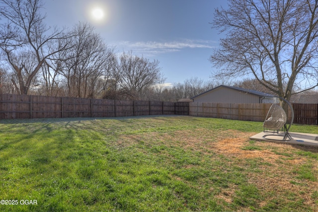 view of yard featuring a fenced backyard