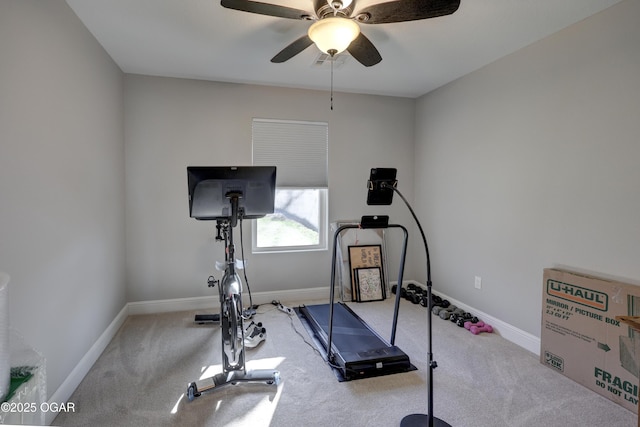 exercise room featuring visible vents, baseboards, carpet floors, and a ceiling fan