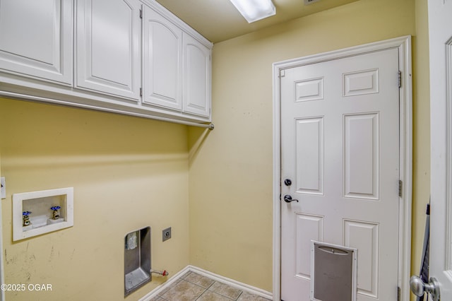 laundry room with light tile patterned floors, hookup for a washing machine, baseboards, cabinet space, and electric dryer hookup