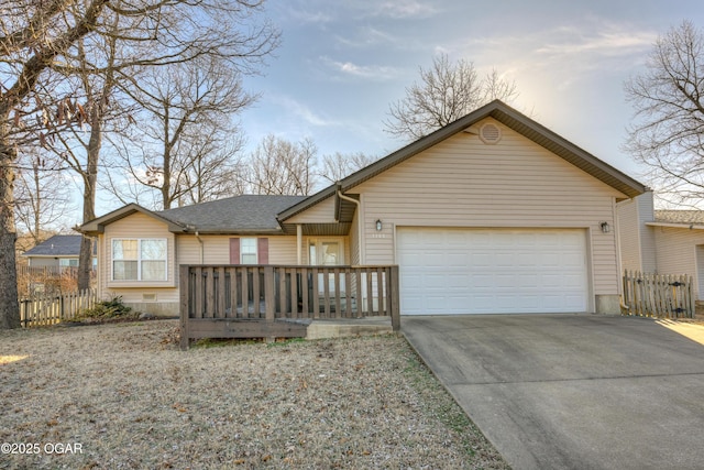 single story home with an attached garage, driveway, fence, and a shingled roof