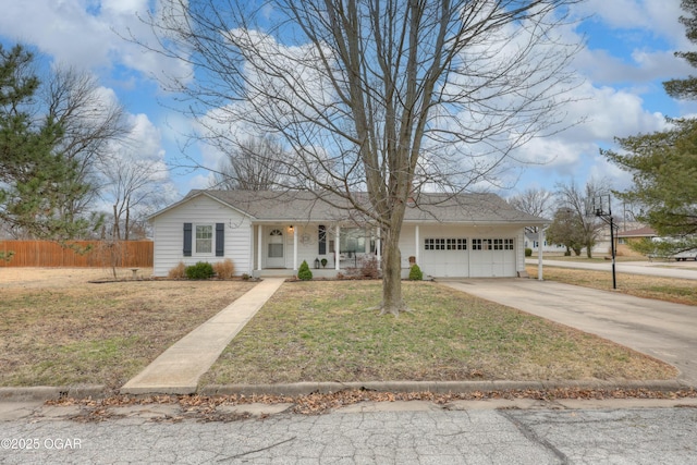 ranch-style home with driveway, an attached garage, covered porch, fence, and a front lawn