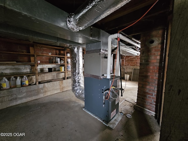 utility room with heating unit