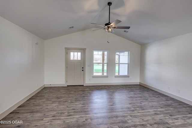 interior space featuring lofted ceiling, ceiling fan, visible vents, and wood finished floors