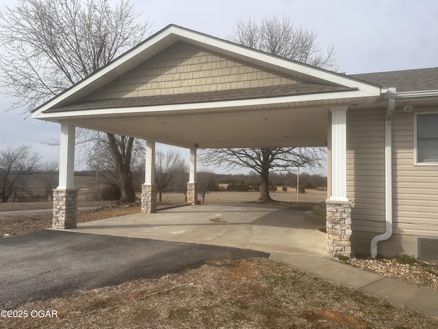 view of vehicle parking with driveway