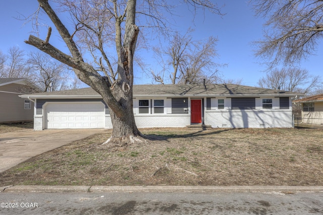 view of front of home with brick siding, an attached garage, entry steps, crawl space, and driveway