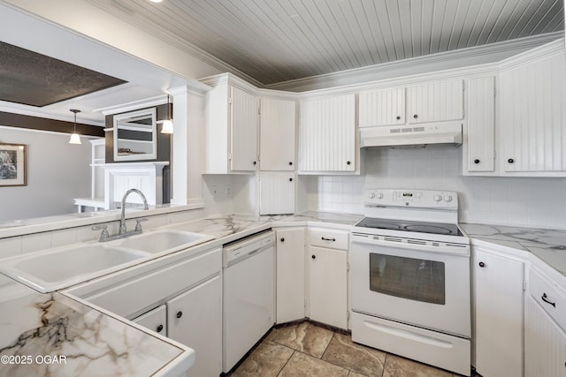 kitchen with white appliances, light countertops, under cabinet range hood, white cabinetry, and a sink