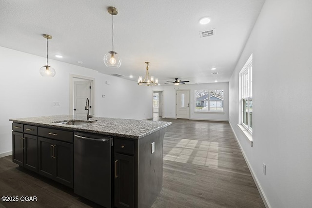 kitchen with visible vents, dishwasher, pendant lighting, dark wood-style floors, and a sink