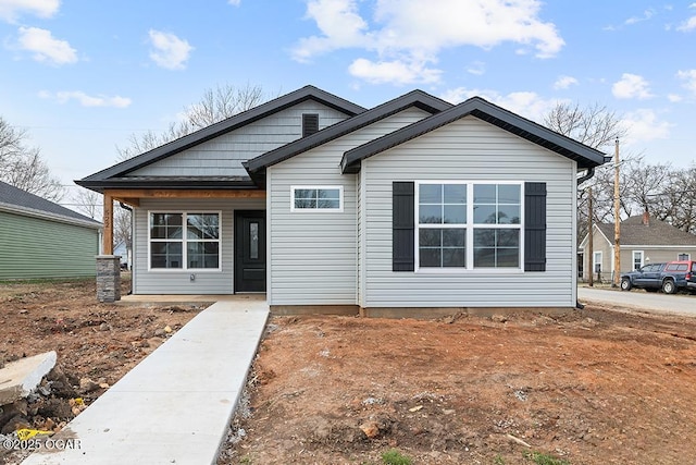 view of front of property featuring covered porch