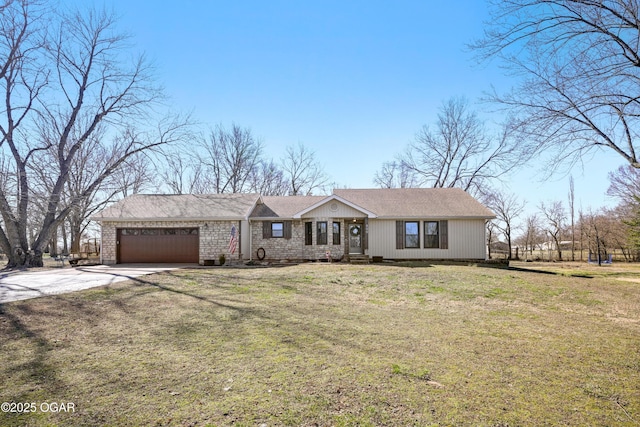 ranch-style home with driveway, a front lawn, and a garage