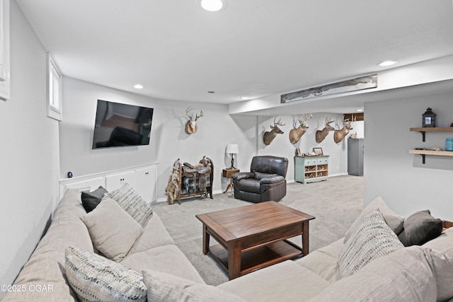 carpeted living room featuring recessed lighting and baseboards