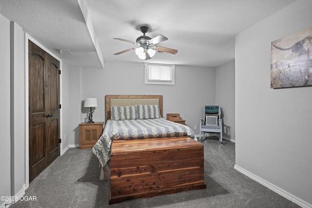 bedroom with visible vents, baseboards, carpet flooring, a textured ceiling, and a ceiling fan