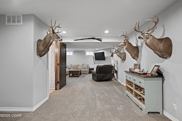 interior space featuring recessed lighting, visible vents, baseboards, and carpet flooring