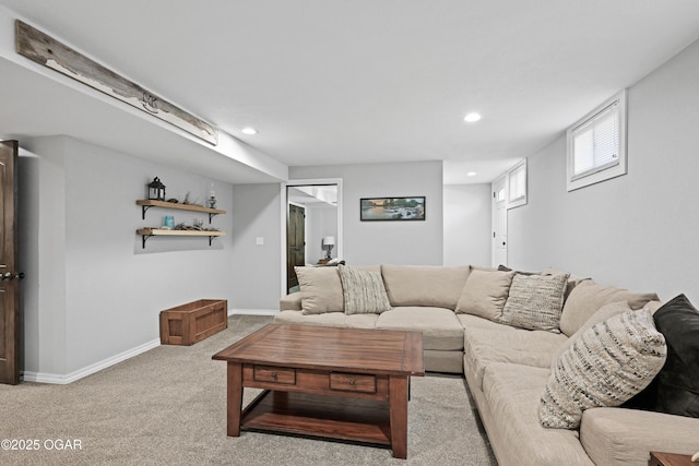 carpeted living room with recessed lighting and baseboards