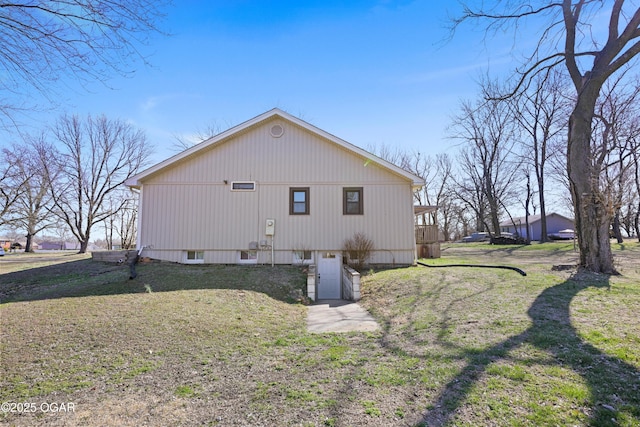 view of home's exterior featuring a yard