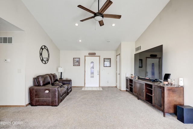 living room featuring recessed lighting, visible vents, light colored carpet, and lofted ceiling