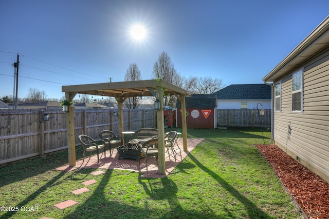 view of yard with a fenced backyard, an outdoor structure, a shed, and a patio area