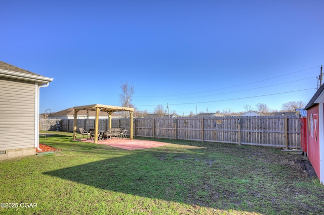 view of yard with a patio and a fenced backyard