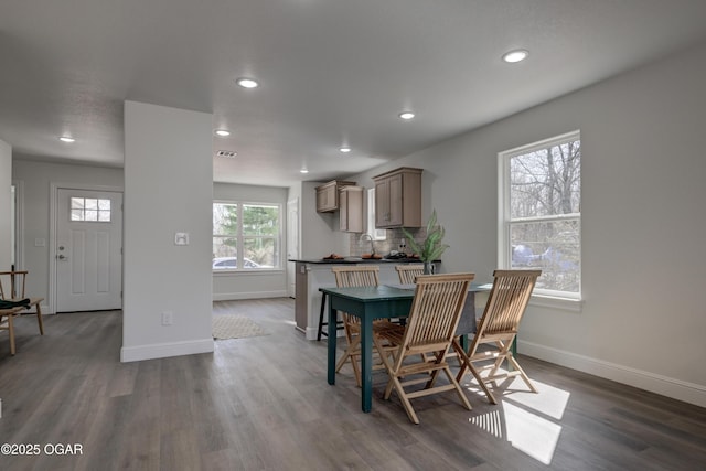 dining area featuring visible vents, recessed lighting, baseboards, and wood finished floors