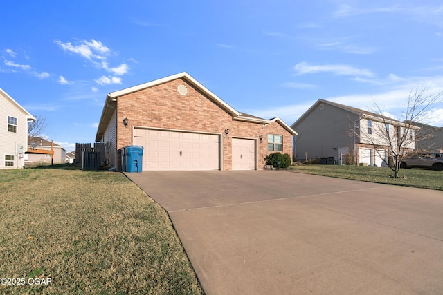 single story home featuring driveway, central AC, a front yard, an attached garage, and brick siding