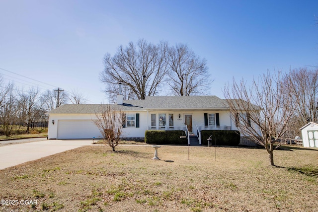 ranch-style home with a front yard, a porch, a chimney, concrete driveway, and a garage