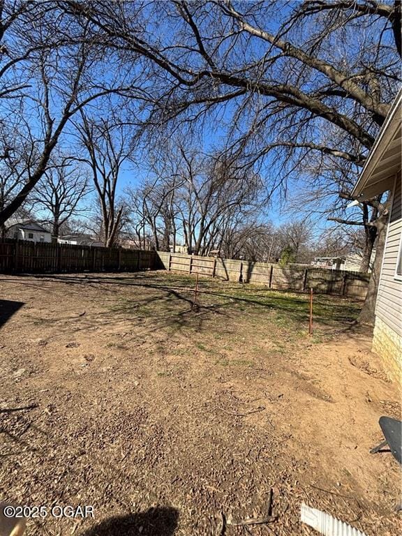 view of yard with fence