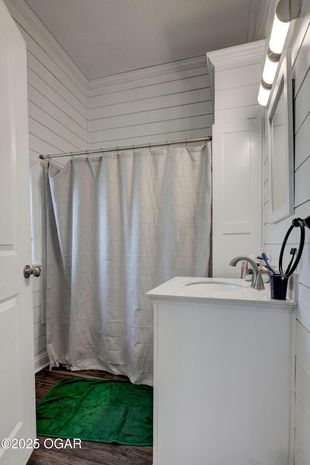 bathroom featuring vanity and curtained shower