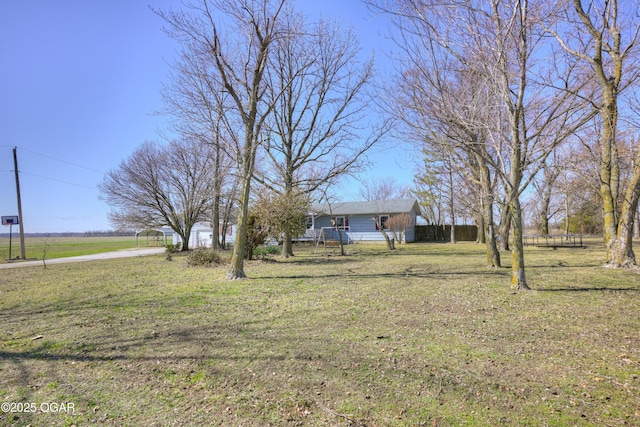 view of yard featuring fence