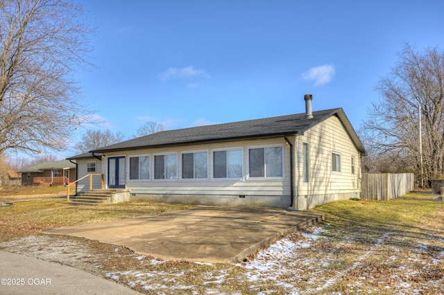 ranch-style house with crawl space and fence