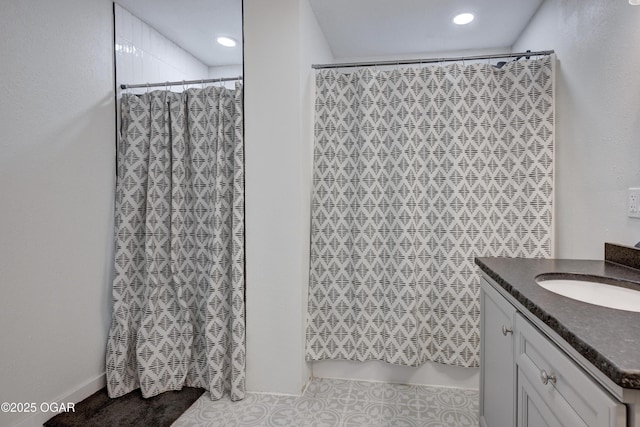 full bathroom with tile patterned floors, curtained shower, recessed lighting, and vanity