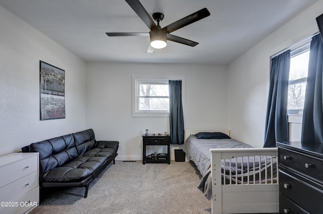 bedroom featuring a ceiling fan and carpet flooring