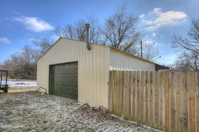 detached garage with fence