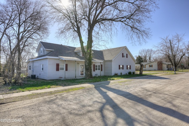 view of front of house with roof with shingles